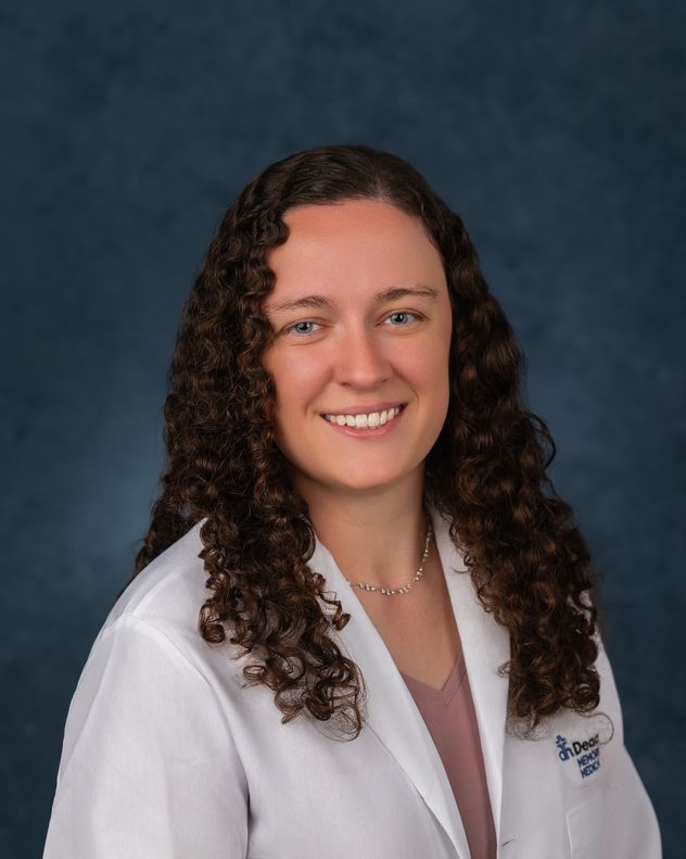 Dr.
