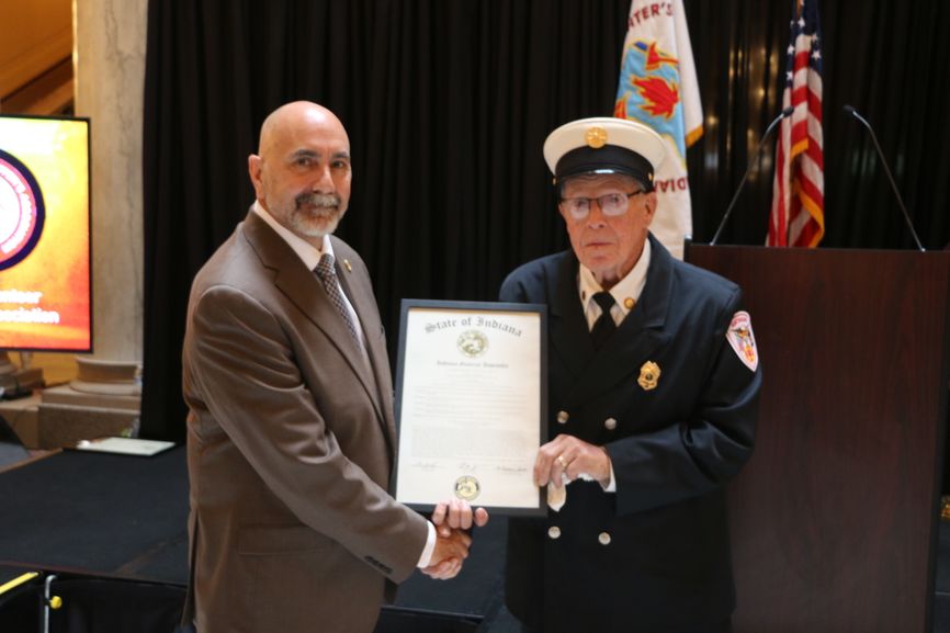 Rep. Bartels helps honor Huntingburg volunteer firefighter for 50 years of service