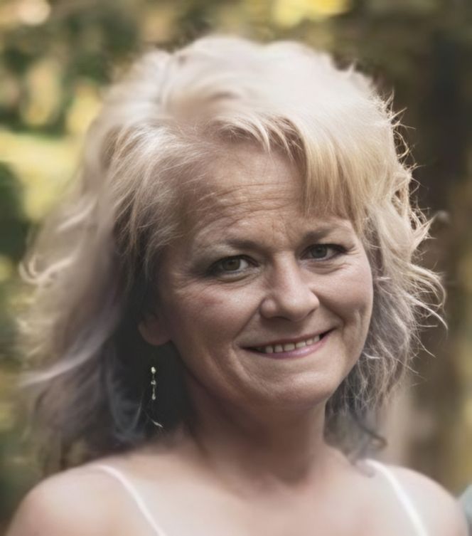 Nicole Lee Ryan, 53, of Bedford