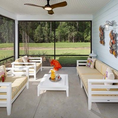Covered veranda with three sofas
