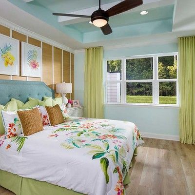 Bedroom with king size bed and large window