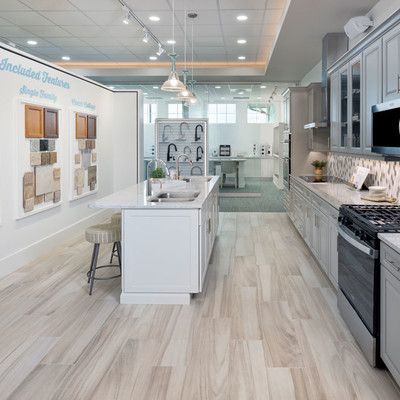 Kitchen with center island and wood options on the wall
