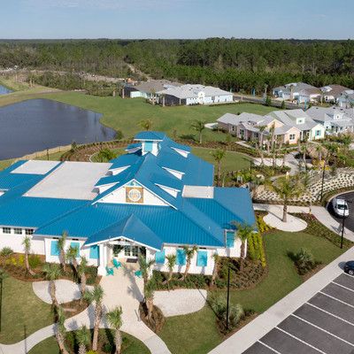 Aerial view of Latitude Watersound sales center building and parking lot