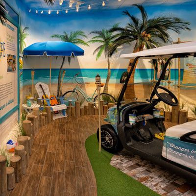 A golf cart in a beach setting