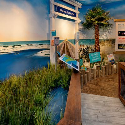 The entrance to the store is through a wooden decorative bridge