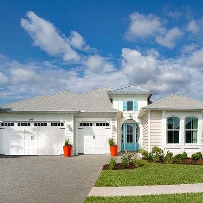 One-storey house with garage and lawn