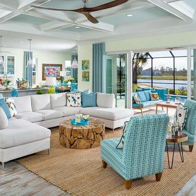 Large living room with sofa and two armchairs