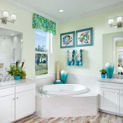 Bathroom with bathtub and side tables