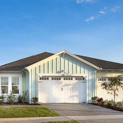 One-storey house with garage and lawn