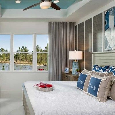 Bedroom with king size bed and window
