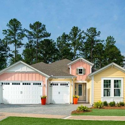 One-storey house with garage and lawn