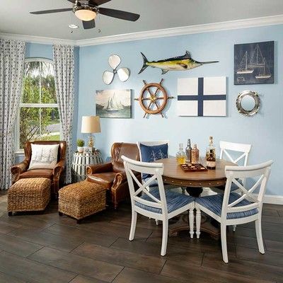 Room with table, chairs and armchairs