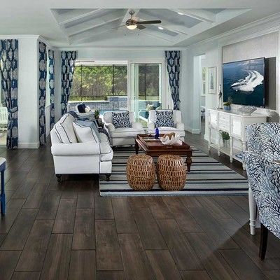 Large living room with sofa and armchairs