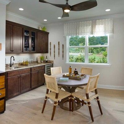 Room with a round table and chairs
