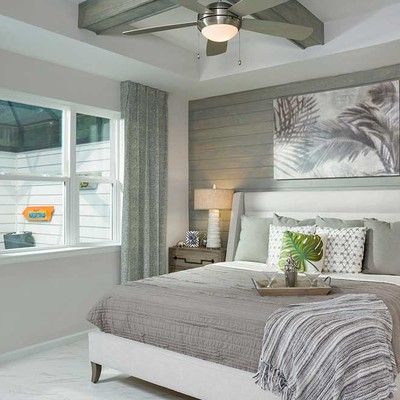 Bedroom with king size bed and large window