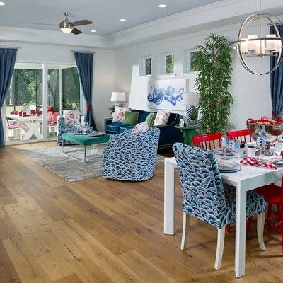 Large room with dining area and large sofa