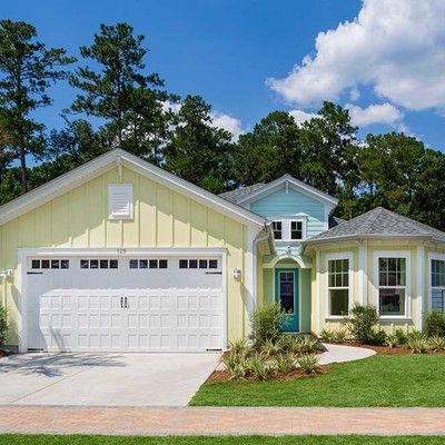 One-storey house with garage and lawn