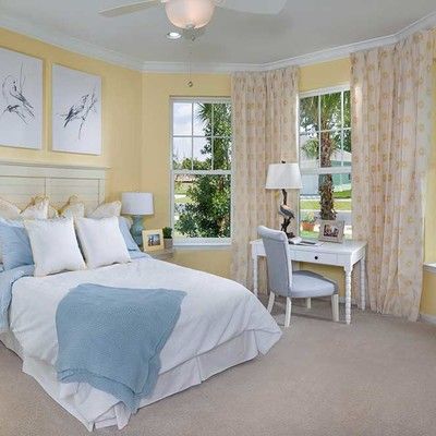 Bedroom with king size bed and windows