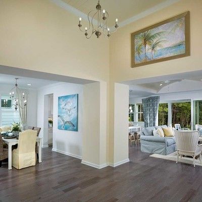Large room with dining area and sofa