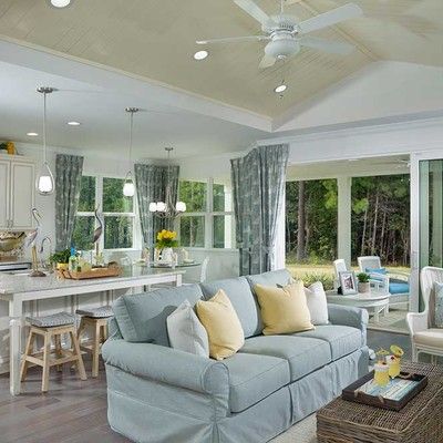 Large room with kitchen and sofa