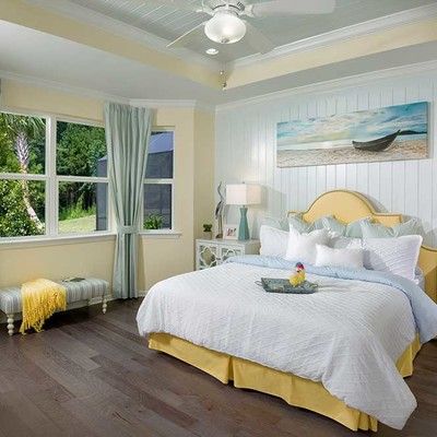 Bedroom with king size bed and large window