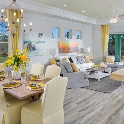 Large living room with sofa, two armchairs and tabel