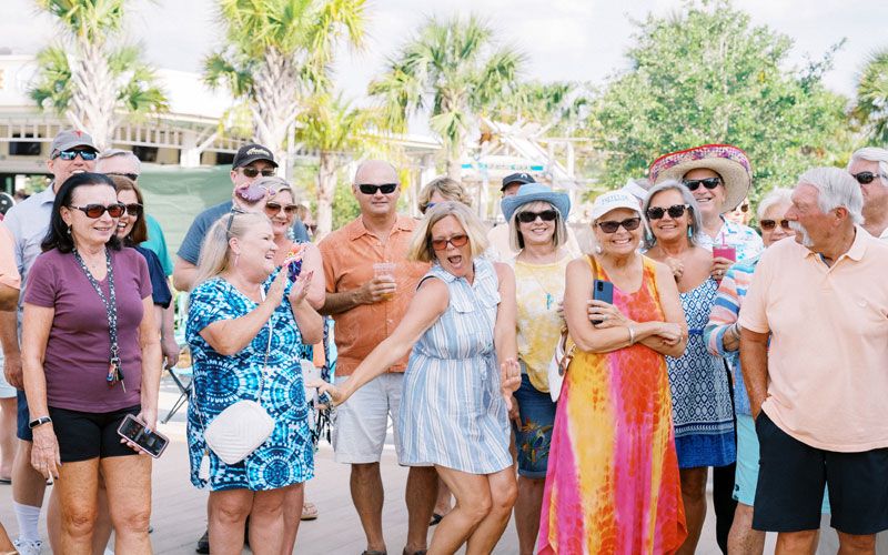 Residents enjoying outdoor amenities, public spaces and group activities
