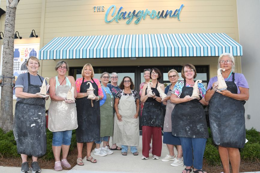 Residents gather around the island-inspired pool, cabanas and refreshment bars