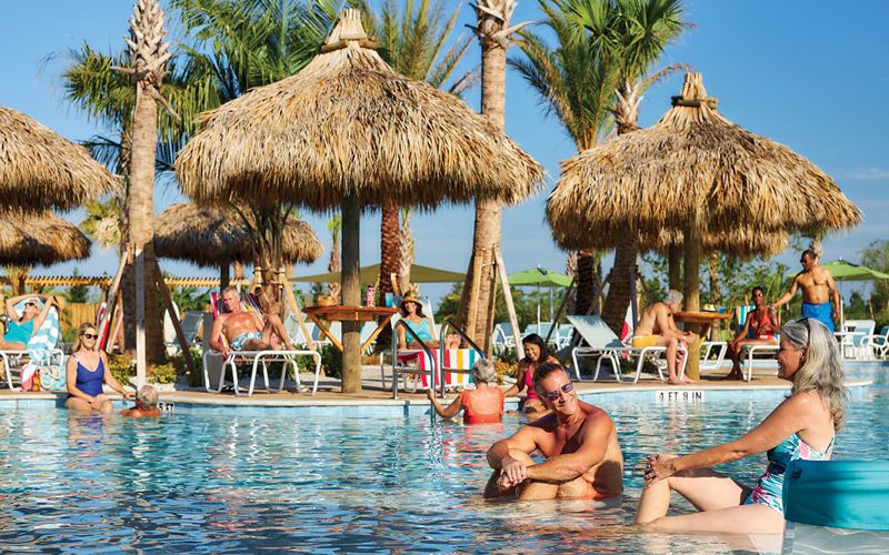 Jimmy Buffett and friends enjoying the pool and other amenities