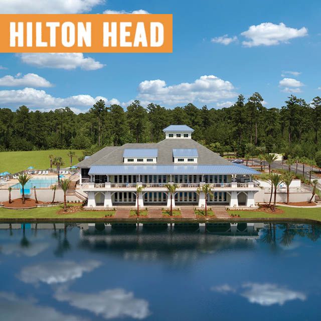 Latitude Margaritaville Hilton Head logo overlaying the Lake Latitude Club Exterior