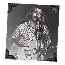 Photo of young Jimmy Buffett with a guitar