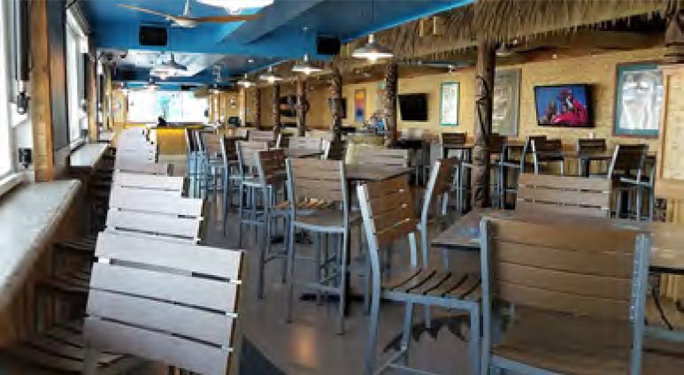 Tiki Bar with long bar looking outside