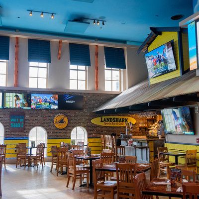 Inside of Landshark with various tables and bar