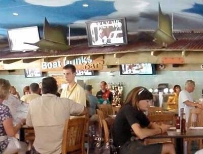 Photo of customers seated at the indoor Boat Drinks Bar in Margaritaville