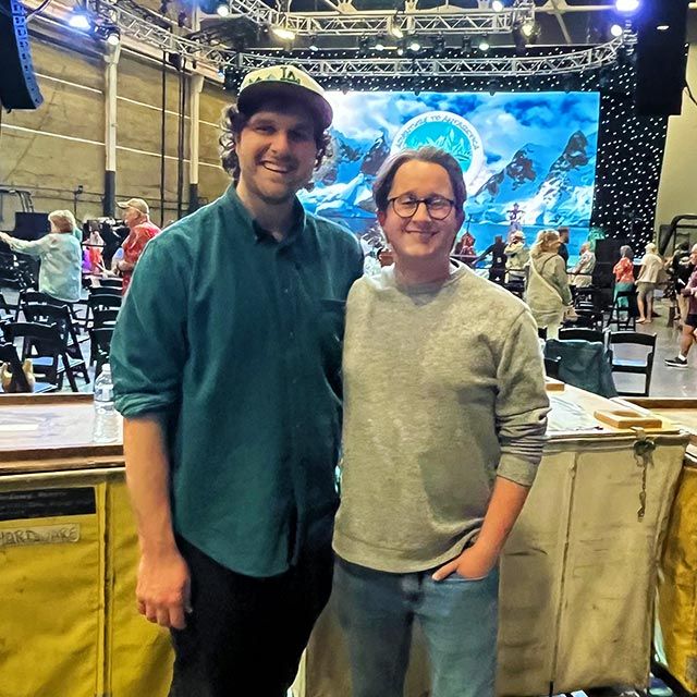 Two Radio Margaritville guys standing at a music event