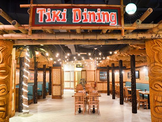 TIKI DINING Interior with tables and chairs