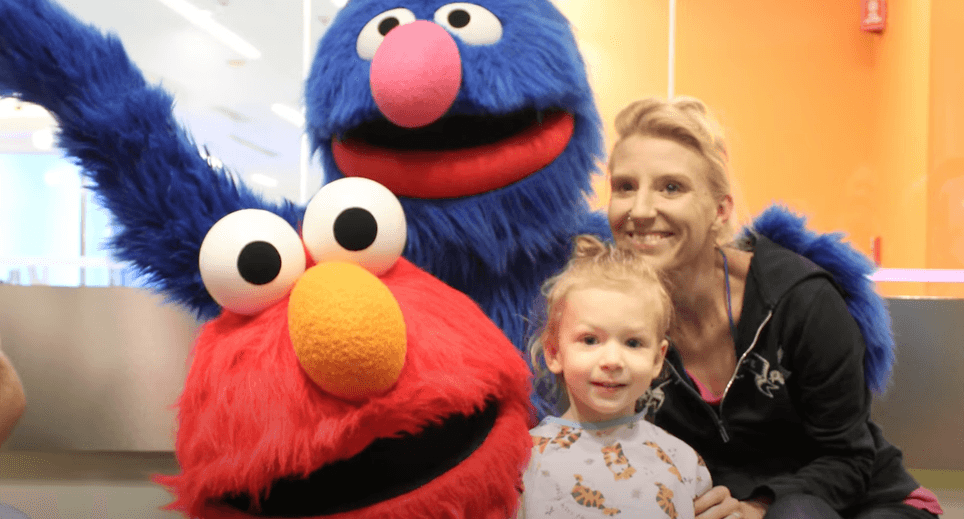 Elmo And Grover Dance With Patients At Seacrest Studios