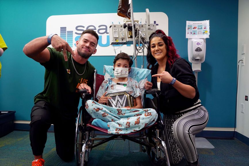 WWE Superstars Bayley & Austin Theory make friends with Boston Children’s patients!
