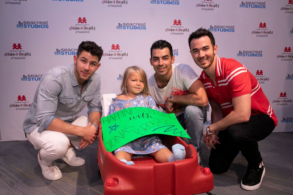 Happiness Begins With Kevin, Joe, and Nick