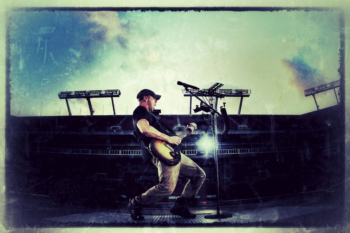 Kenny performing Kenny performing