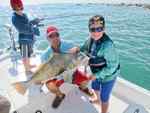 Vincent Kalisky with dad Port Aransas jetties - 38" black drum