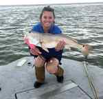 Kellie Walker Matagorda Bay, first wadefishing trip - 27" redfish