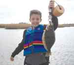 Dylan Givens Neches River13&quot; first flounder!