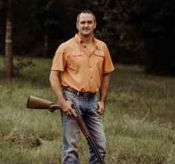 ERNEST BAILES, AGENT