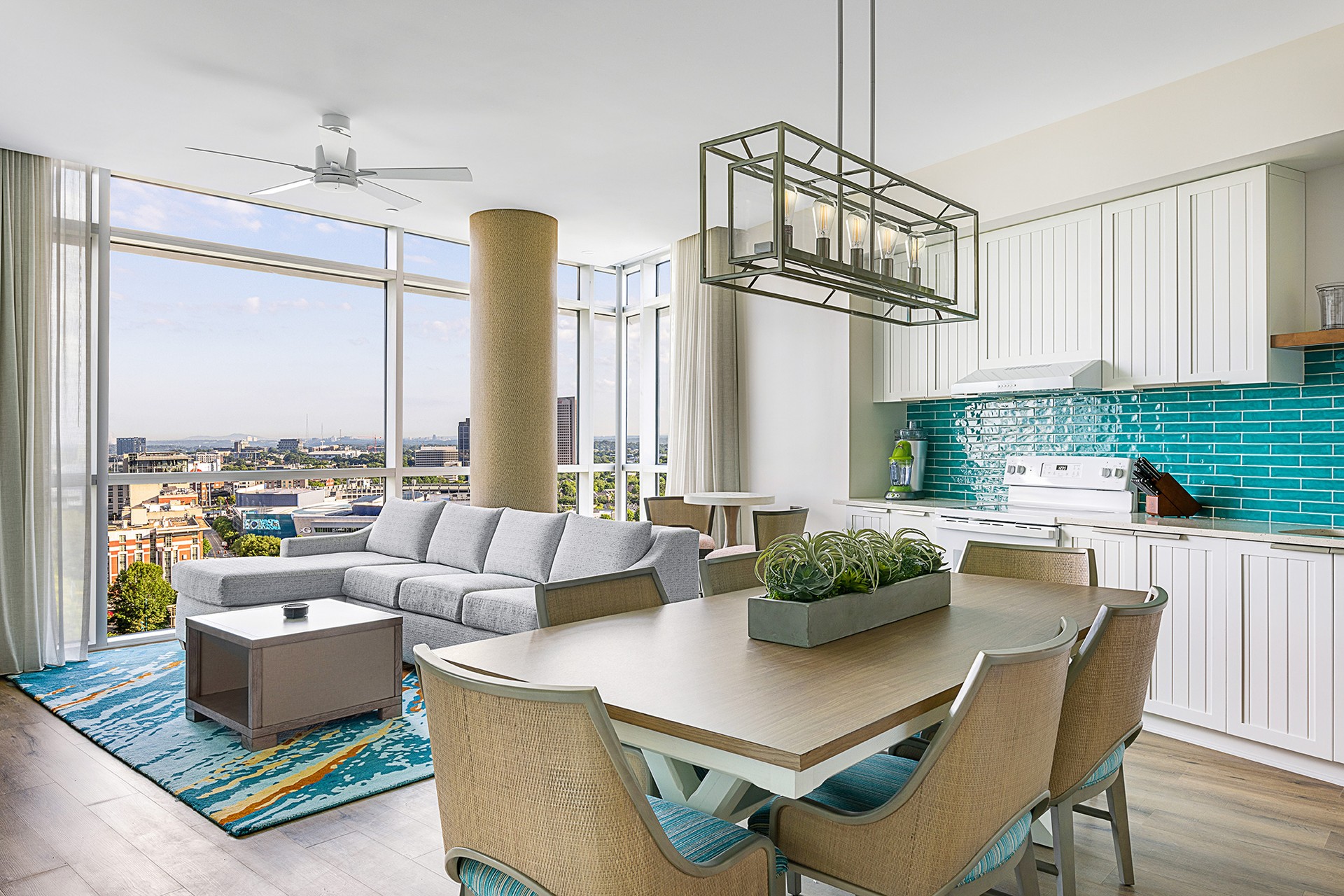 221128-Atlanta-MGVC-2BR-IN-001.jpg pacious living and dining area with modern furnishings