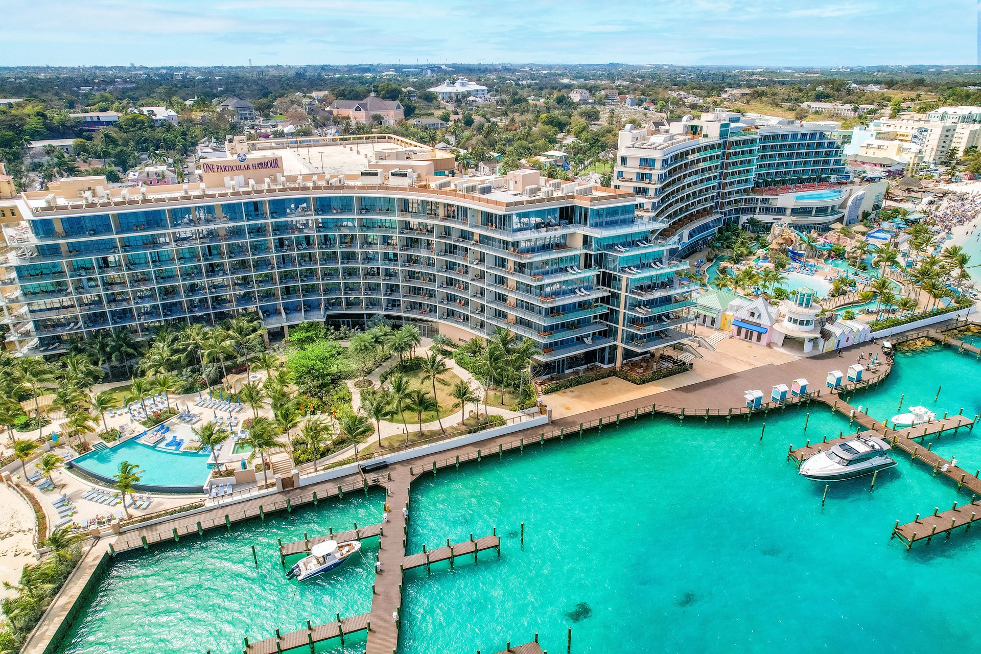 241112-MVNassauBeachResort-Exterior-OPH2.jpg Scenic aerial view showing resort layout with pool and marina