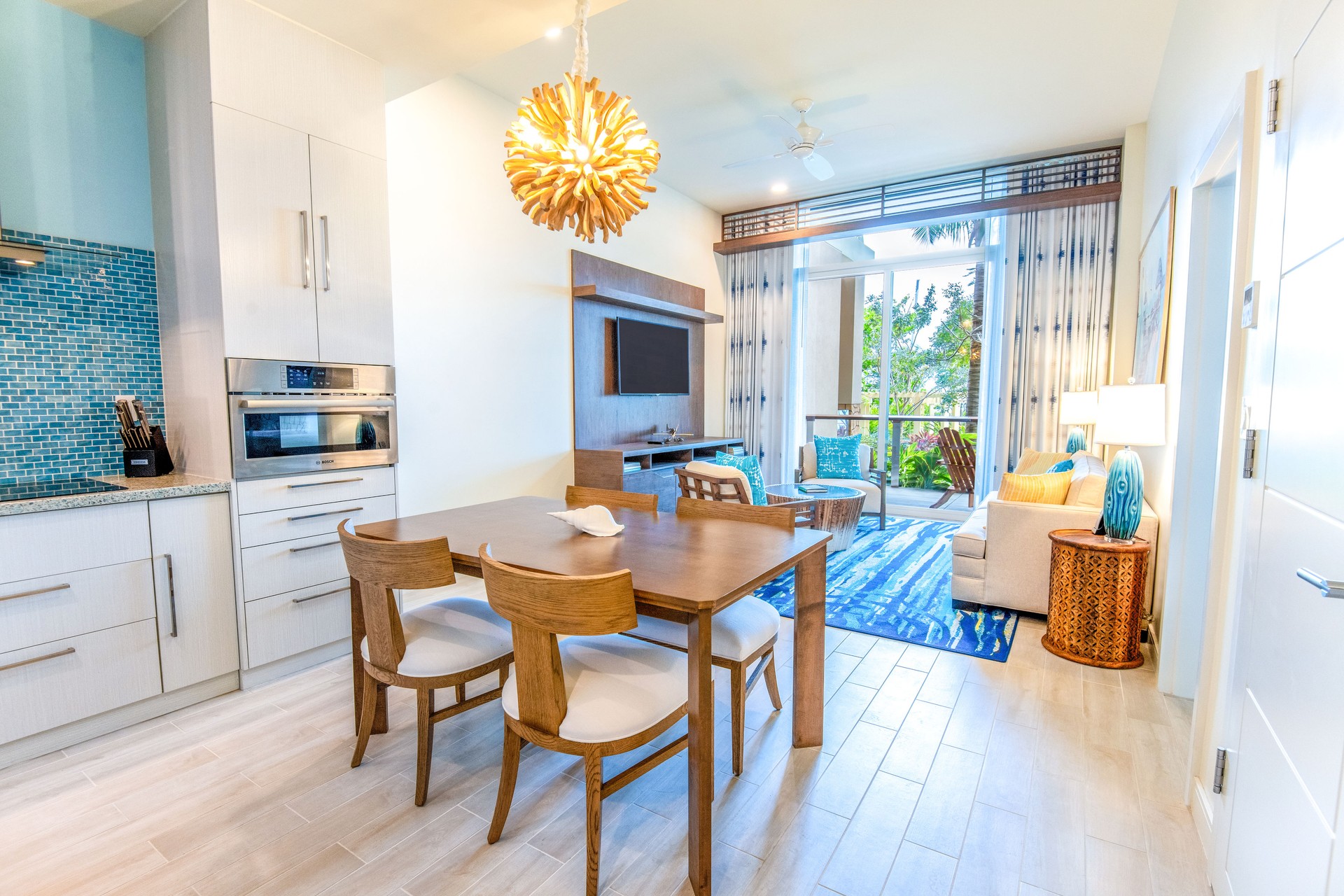 241112-MVNassauBeachResort-OPH-9068.jpg Open-concept living and dining area with modern coastal design