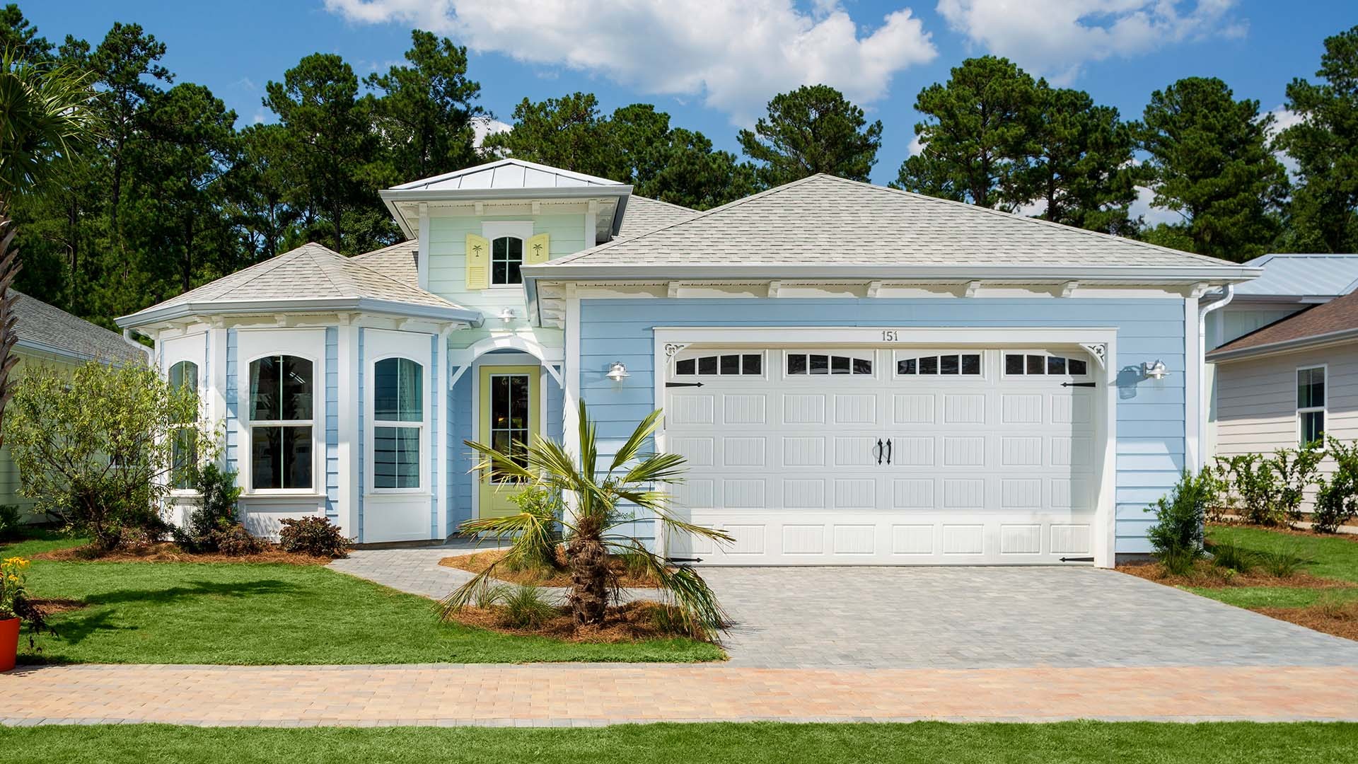 hero_6.jpg A blue bungalow style house in Panama.