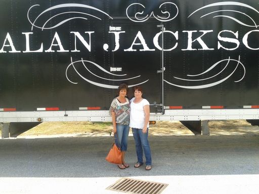 Ava and her cousin in front of his truck in Columbus, GA 