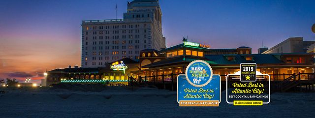 Restaurant building and text: Voted best in Atlantic city! Best cocktail bar (casino). Reader's choice awards